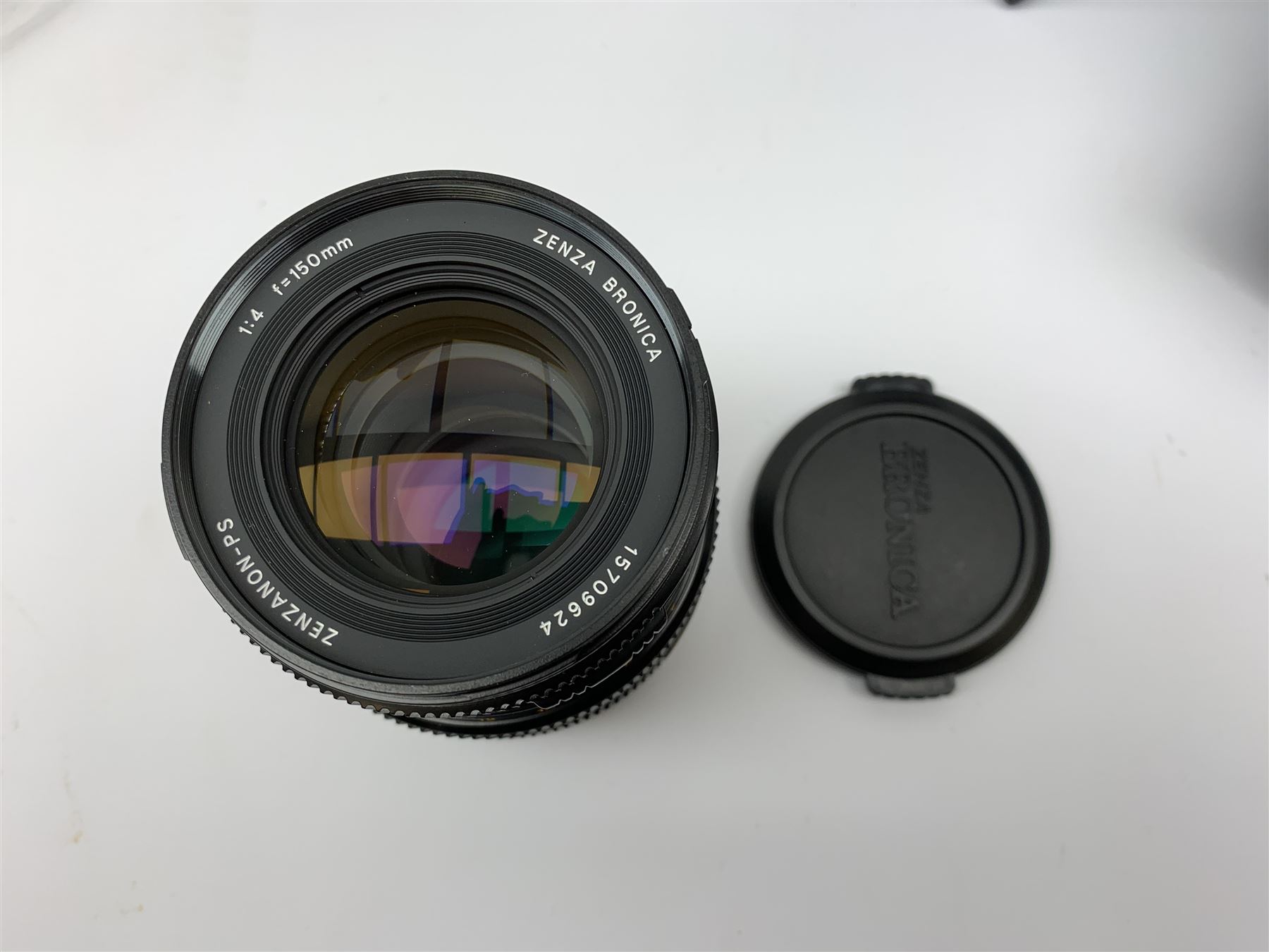 'Zenza Bronica SQ-B' camera fitted with 'Zenza Bronica Zenzanon-PS 1:28 f=80mm' lens, 'Zenza Bronica Zenzanon-PS 1:4 f=150mm' lens and 'Zenza Bronica Zenzanon-S 1:35 f=50mm' lens, with an instruction booklet