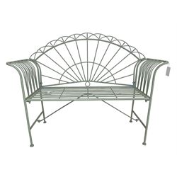 Regency design wrought metal bench, the fan back over out-swept arms, strap seat on supports united by stretchers, in pale teal finish