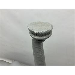 Composite figure of an elephant, painted grey, upon white base, L45cm H65cm