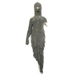 Neoclassical 19th century plaster pedestal, the base cast as two straining Atlantes on a naturalistic rocky base, unmarked, excluding fittings H65cm; together with a set of three plaster figures, cast as Egyptian ladies in headdresses and draped in cloth, by John Dominic Giannelli (1775-1841), the reverse with hieroglyphic decoration, inscribed 'Published as the Act Directed By J D Giannelli 1805', possibly corresponding attachments for the aforementioned pedestal, H62cm 
Provenance: property of a Nobleman