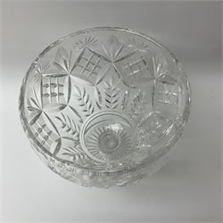 Cut glass centerpiece bowl, of tapering form upon short thick stem and circular foot with star cut base, H23cm D20cm.