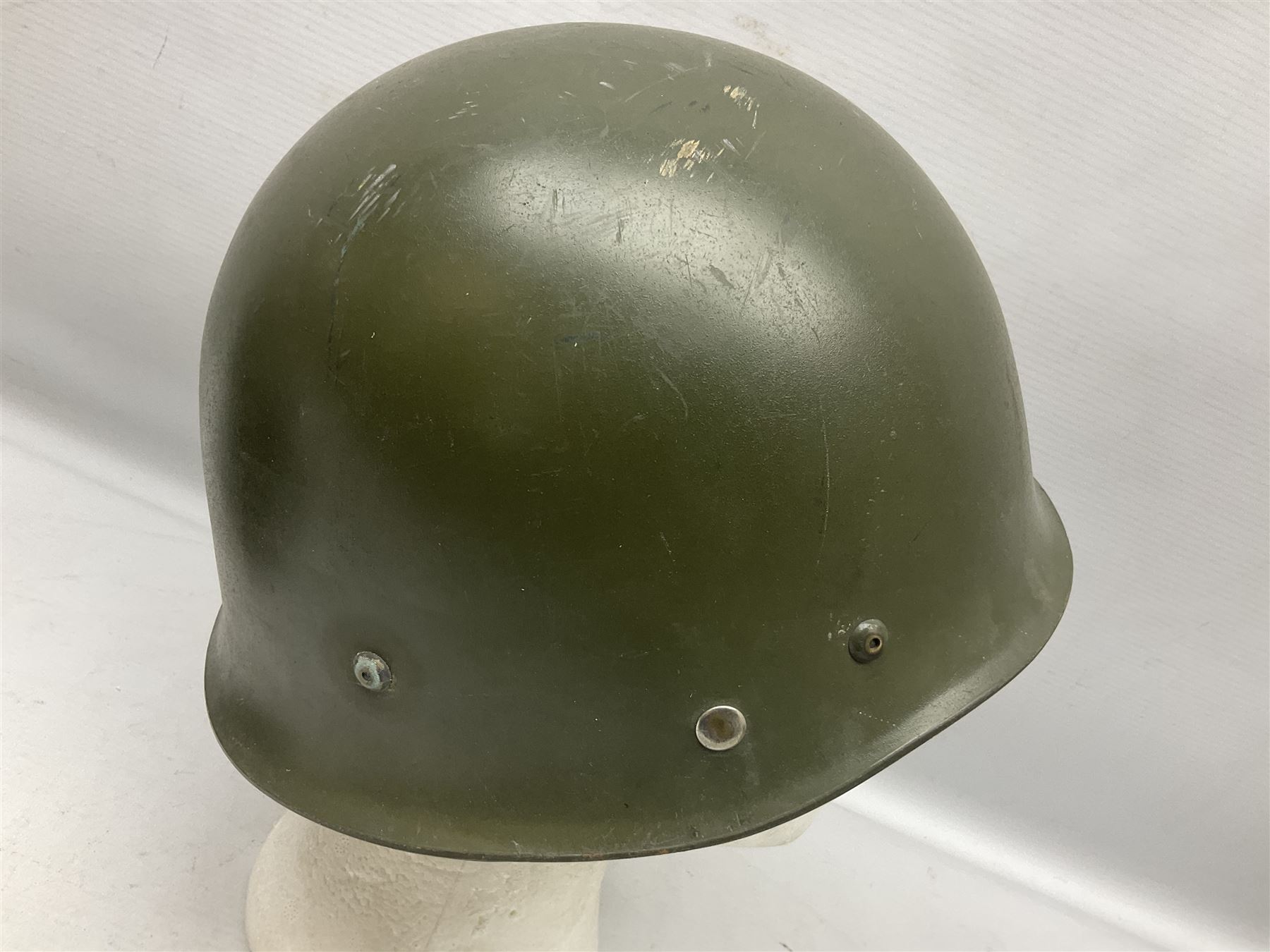 1950s French Algerian War steel helmet with liner; indistinctly marked 'S.I.A. LE EANS(?) 71R'