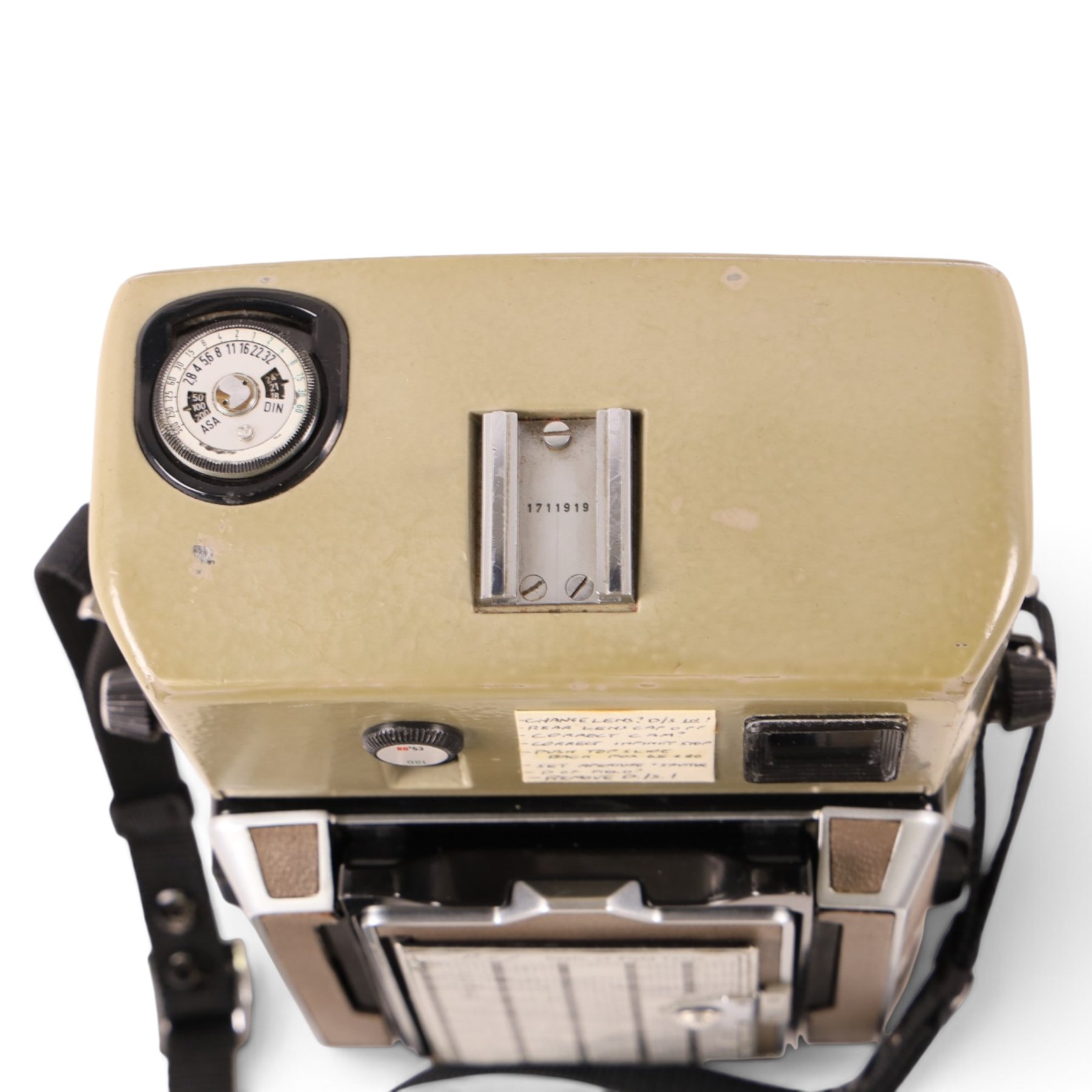 Linhof Tecnika 70 medium format press camera serial no. 1711919, with a Xenotar 1:2.8/80 lens serial no. 9254350 and a Symmar 1:5.6/180 lens serial no. 8357904, both coupled to the camera, and additional accessories including Symmar-S 5.6/100 lens, and a Carl Zeiss Jena Apo-Lanthar 40mm1:4.5 macrolens, numbered set of seven Linhof dark slides, super rollex roll film holder and anatomical grip, all contained within modern case