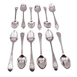 Set of twelve George III and later matched Celtic point pattern teaspoons, with bright cut engraved decoration, various hallmarks, to include a pair of William IV examples hallmarked James Beebe, London 1832, a further pair of William IV examples hallmarked William Chawner II, London 1830, approximate total weight 5.40 ozt (168.1 grams)