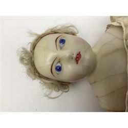 Victorian wax shoulder head doll with pale complexion, applied hair, inset glass eyes and fabric covered jointed body with kid leather lower arms; white linen dress and undergarments H50cm