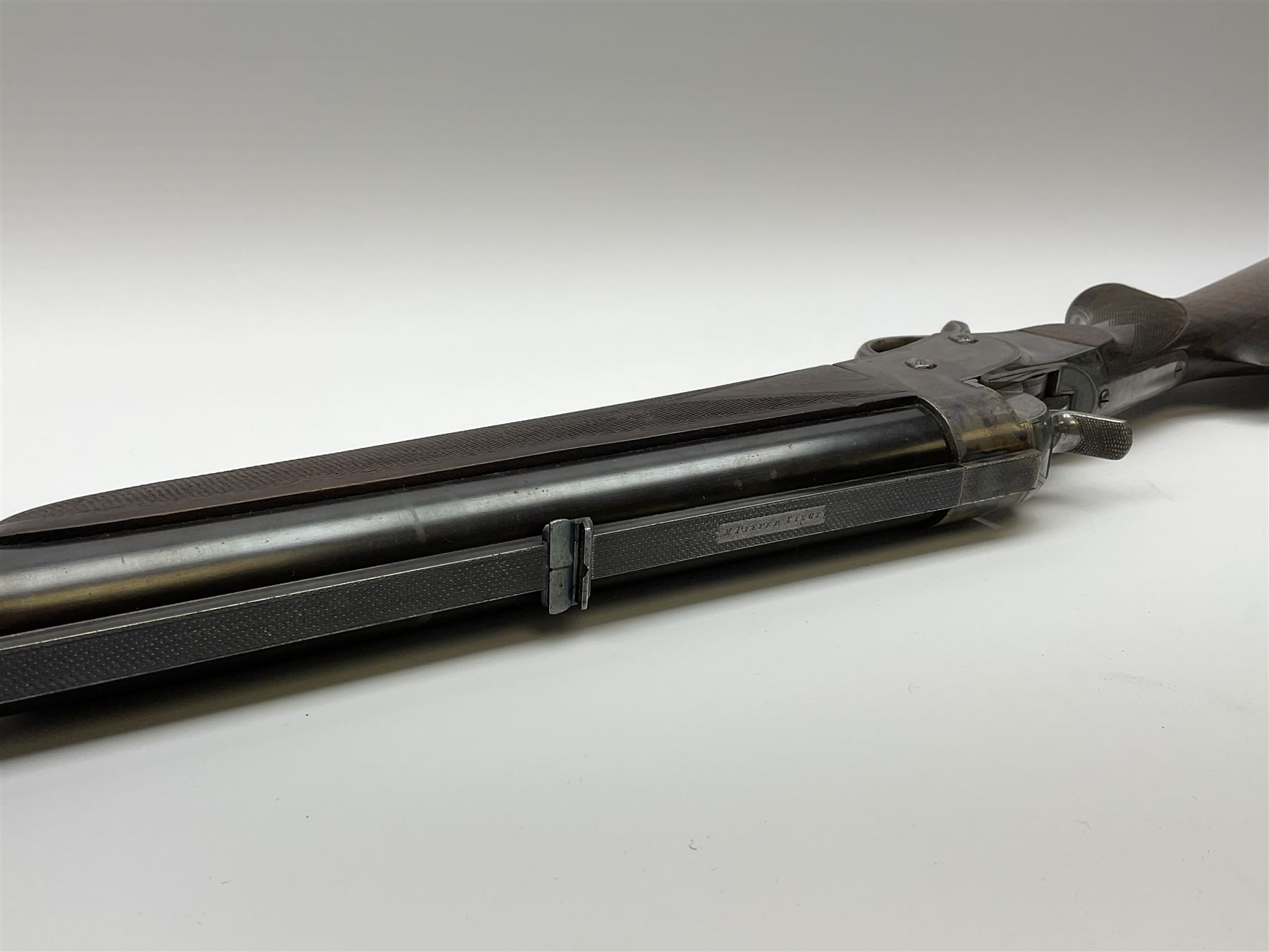 Rare Henry Pieper Liege seven-chambered solid barrel 297/30 calibre rim-fire volley gun with six barrels around a central seventh barrel drilled for simultaneous fire, built on a Remington type rolling block action, blued 62cm barrel with raised rib and twin rear leaf sights, case hardened action complete with loading plate for seven cartridges, walnut stock with chequered pistol grip and fore-end and inset 'silver' cartouche with two Chinese type characters, no.256PLN, L109cm overall