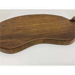 Mouseman - oak kidney-shaped cheeseboard, the handle caved with mouse signature, by the workshop of Robert Thompson, Kilburn 