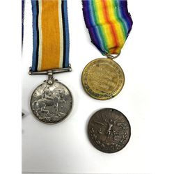 Group of three WW1 medals comprising 1914-15 Star, British War Medal and Victory Medal awarded to 50572 Dvr. E.W. Pybus R.F.A./R.A.; and 1919 bronze Peace medallion (4)