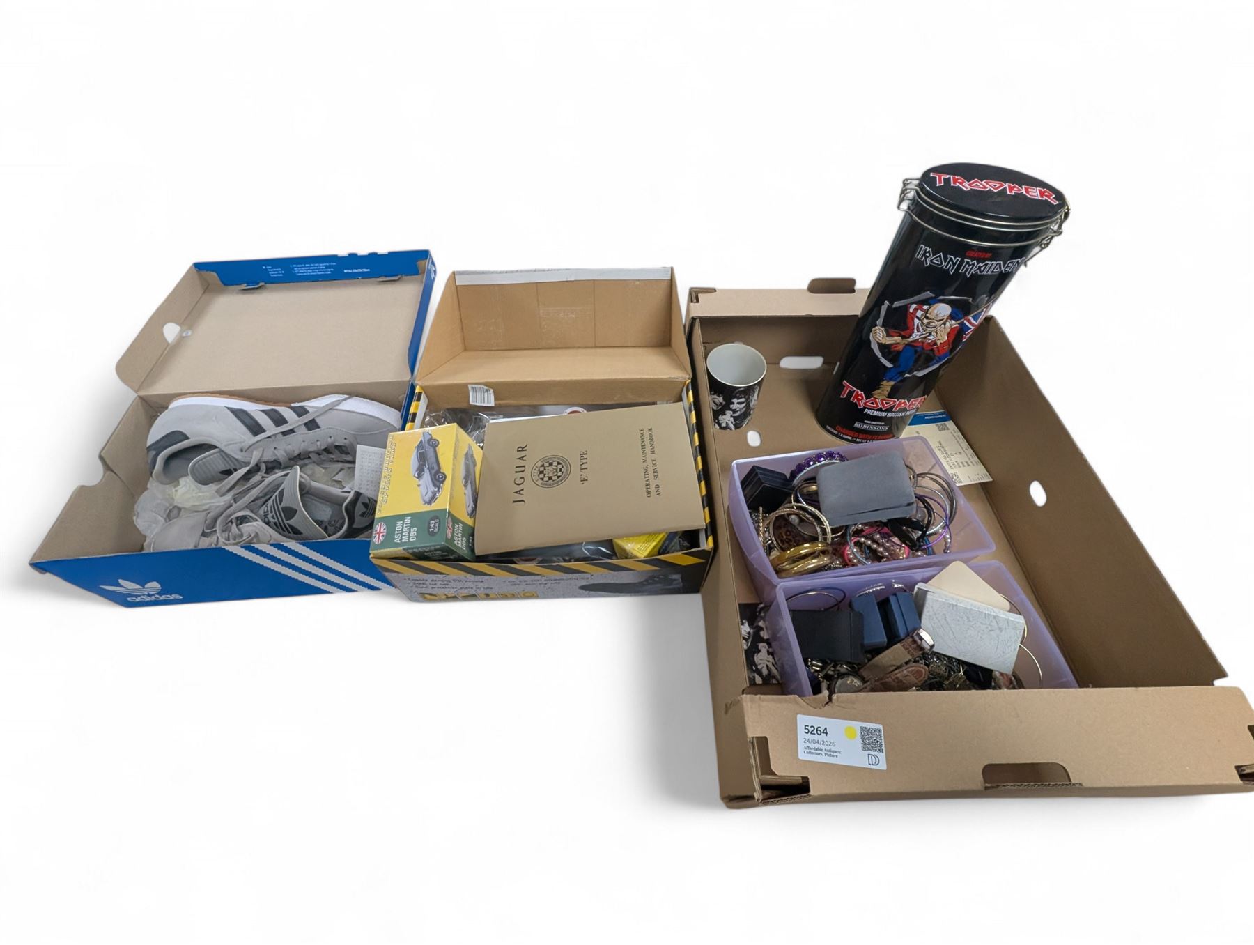 Pair of men's Adidas Samba trainers, Iron Maiden Trooper Beer, three DeAgostini Jaguar E Type magazines and a collection of costume jewellery