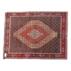 Persian Ardakan rug, featuring central elongated diamond medallion with serrated edges on ...