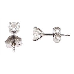  Pair of 18ct white gold diamond stud earrings, stamped 750, diamonds approx 1 carat  