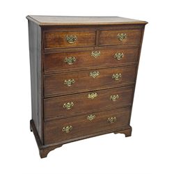 George III oak chest of drawers fitted with two short over four long drawers fitted with swan neck handles, supported on bracket feet