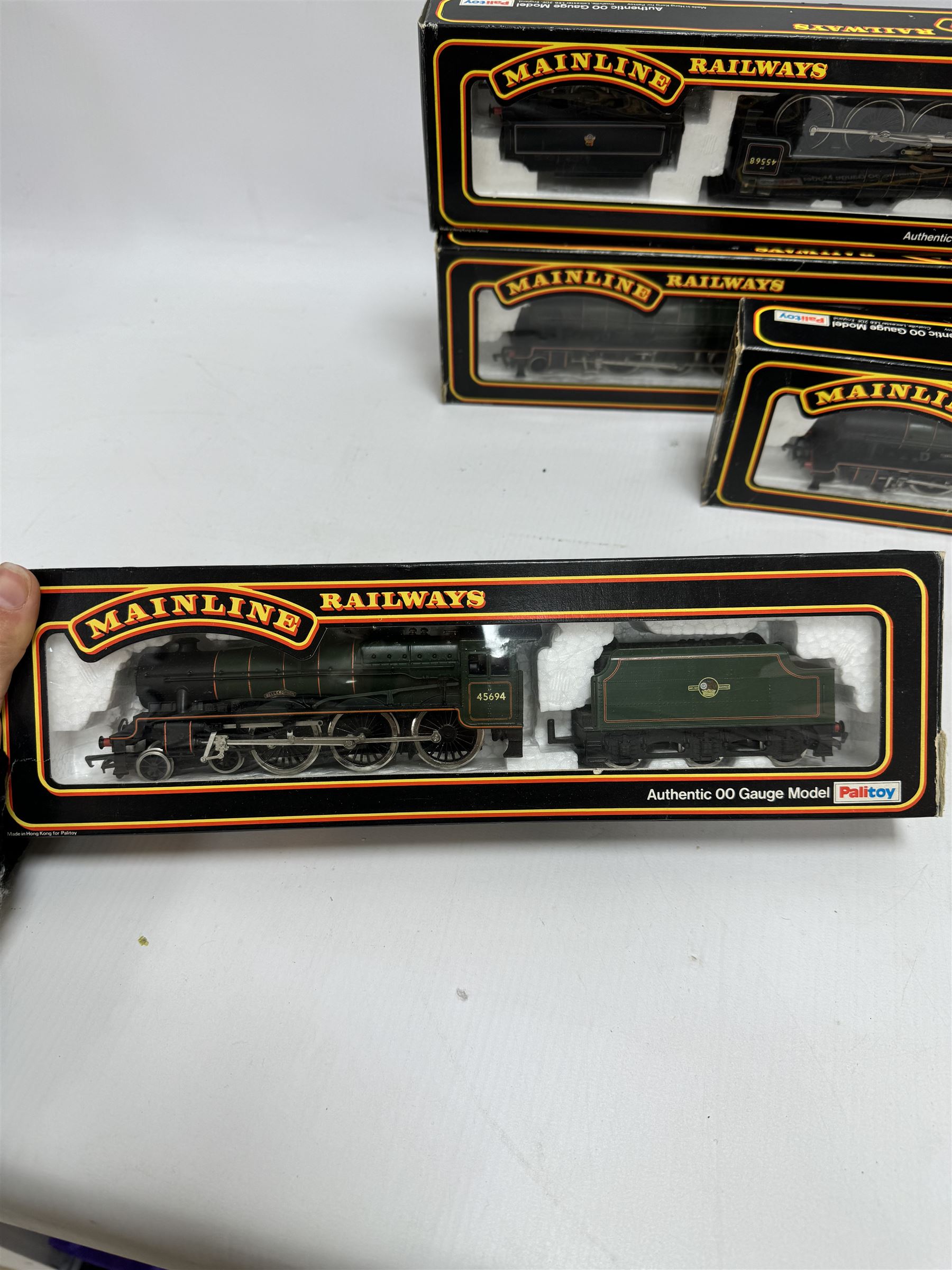 Seven Mainline Railways '00' gauge Jubilee Class 4-6-0 locomotives, comprising five 37062 in BR green livery, reworked as United Province no. 45578, Newfoundland no. 45573, Bellerophon no.45694, Nelson no. 45664 and no. 45691, 37047 Mars locomotive no. 45698 with Fowler tender in BR green livery and 936153 Western Australia locomotive no. 45568 in BR black livery, all boxed