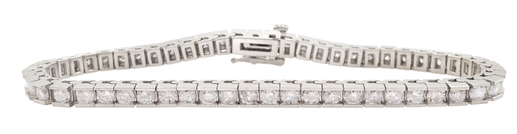White gold round brilliant cut diamond line bracelet, stamped 14K, total diamond weight approx 4.85 carat