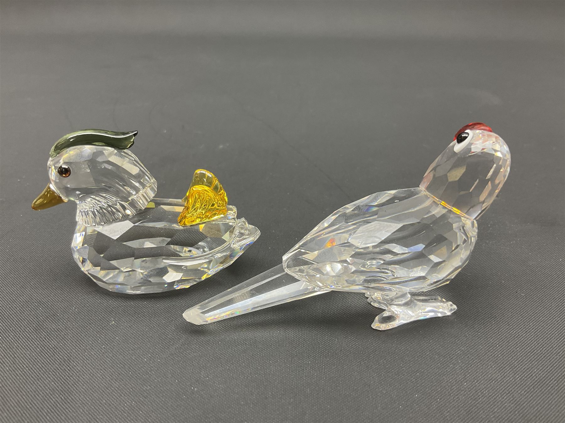Fourteen Swarovski Crystal bird figures, to include toucan, mandarin duck, swans, parrot, cranes etc 