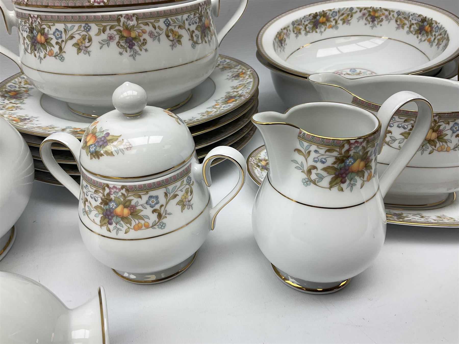 Noritake Ireland tea and dinner wears, comprising of teapot, milk jug, covered sucrier, seven teacups and saucers, seven dessert plates, six dinner plates, seven side plates, five bowls two serving dishes, one lidded tureen and a gravy boat and dish