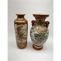 Two Japanese Kutani vases, each decorated with figural and landscape panels, each approximately H36cm, three Imari plates, and a blue and white ginger jar and cover decorated with dragons chasing the flaming pearl. 