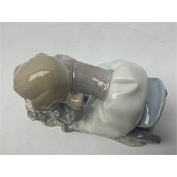 Lladro figure, In No Hurry, modelled as a girl on a tricycle, sculpted by Francisco Polope, with original box, no 5679, year issued 1990, year retired 1994, H15cm