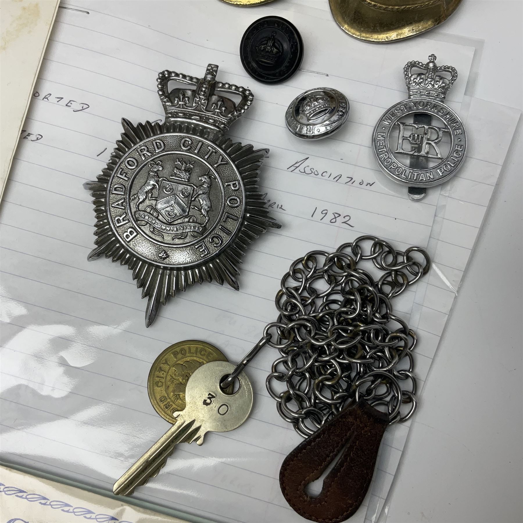 Bradford City Police pre-1974 helmet plate, buttons and Police Box key with finders fob; post-1974 West Yorkshire Police cap badge; Leeds City Police Pockebook with Bradford Notebook; quantity of Girl Guide Memorabilia including boxed Wedgwood limited edition jasperware 1970 Diamond Jubilee loving cup; brass banner pole finial; various metal, silver and enamel badges and paperwork etc 1950s - 1980s all relating to Maureen Margaret Jowett (AKA Jewitt)