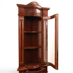 Victorian design mahogany corner cabinet, shaped carved cresting above bowed glazed upper door, with panelled side uprights, lower drawer over cupboard door decorated with floral marquetry, on plinth base