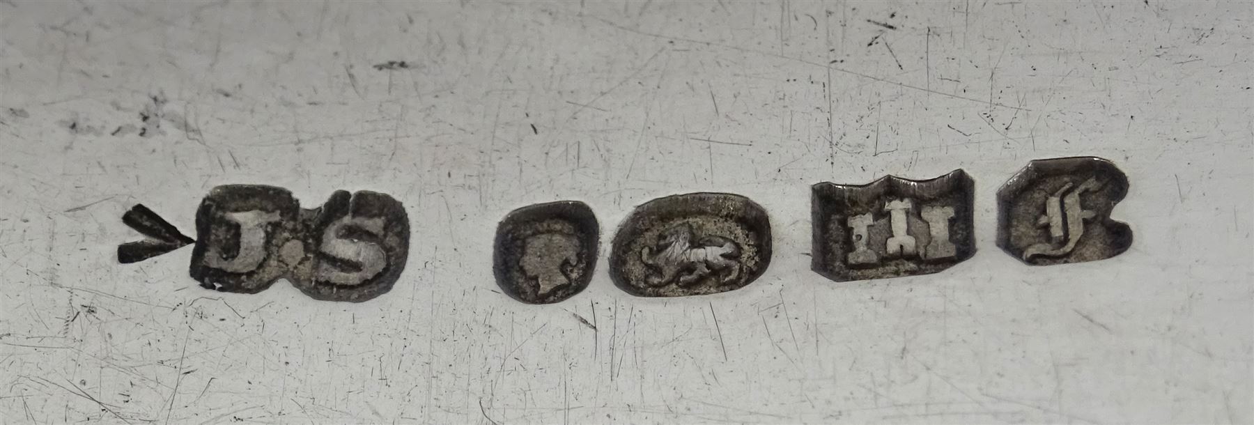 George III silver heart shaped caddy spoon, makers mark IT, Birmingham 1812, gold diamond stick pin, silver cigarette case by Henry Matthews, Birmingham 1906, three silver thimbles and a silver table spoon Fiddle pattern  by John Stone, Exeter 1842