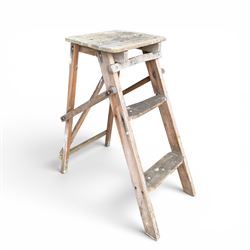Private woodland walk wooden sign along with large saw and wooden step ladders
