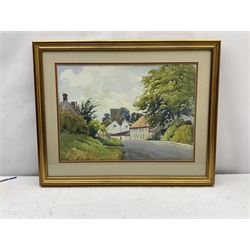Edward H Simpson (British 1901-1989): Folkton Village Main Street and Hiking through the North Yorkshire Moors, two watercolours signed max 36cm x 52cm (2)