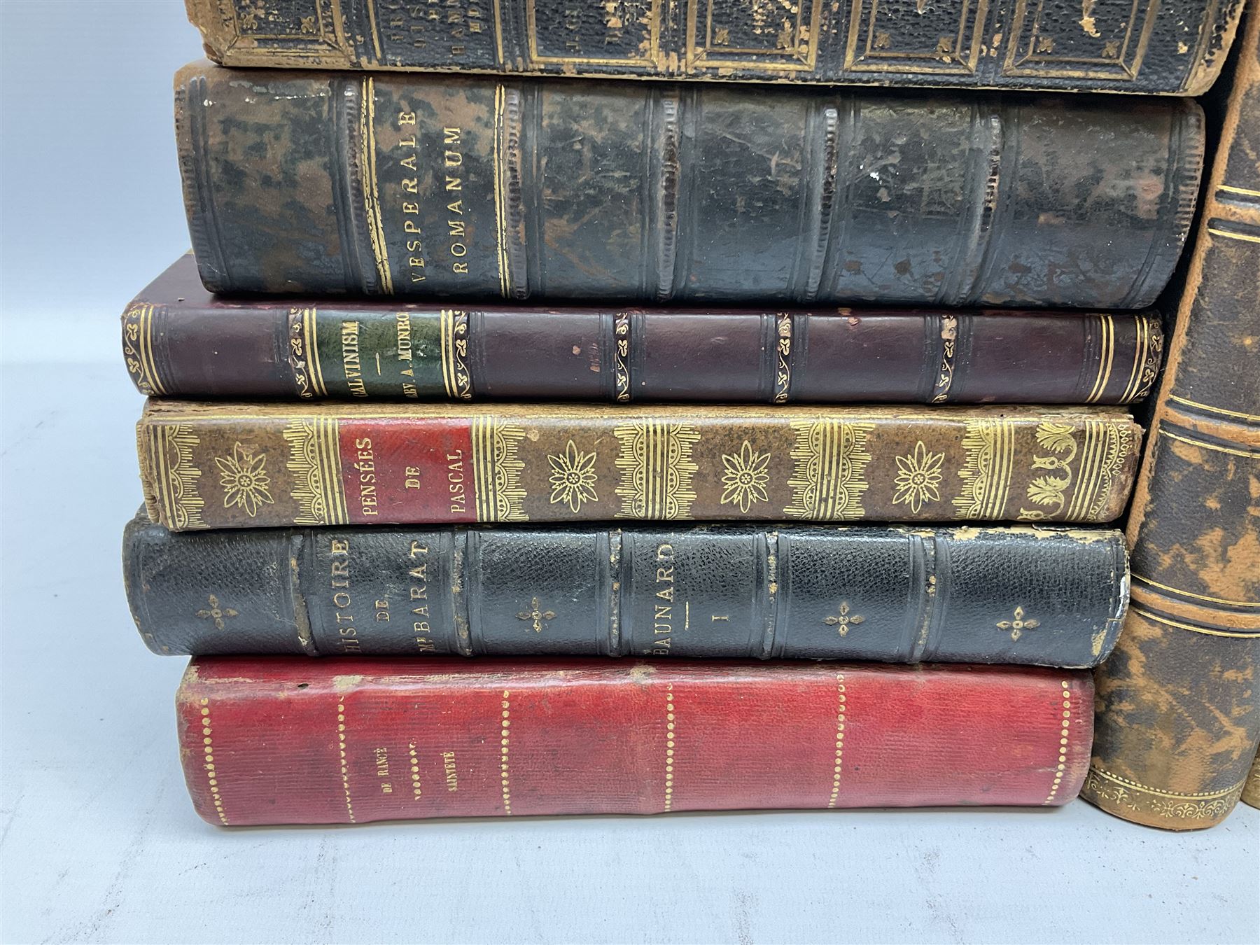 Eighteen 19th century leather bound books including Oeuvres Completes De Voltaire. 1827 Paris. Two volumes; Oeuvres De Pierre Corneille. 1892 Paris; Commentarium in Librum Geneseos Scripsit Thomas Josephus Lamy. 1883 Mechliniae; etc (18)