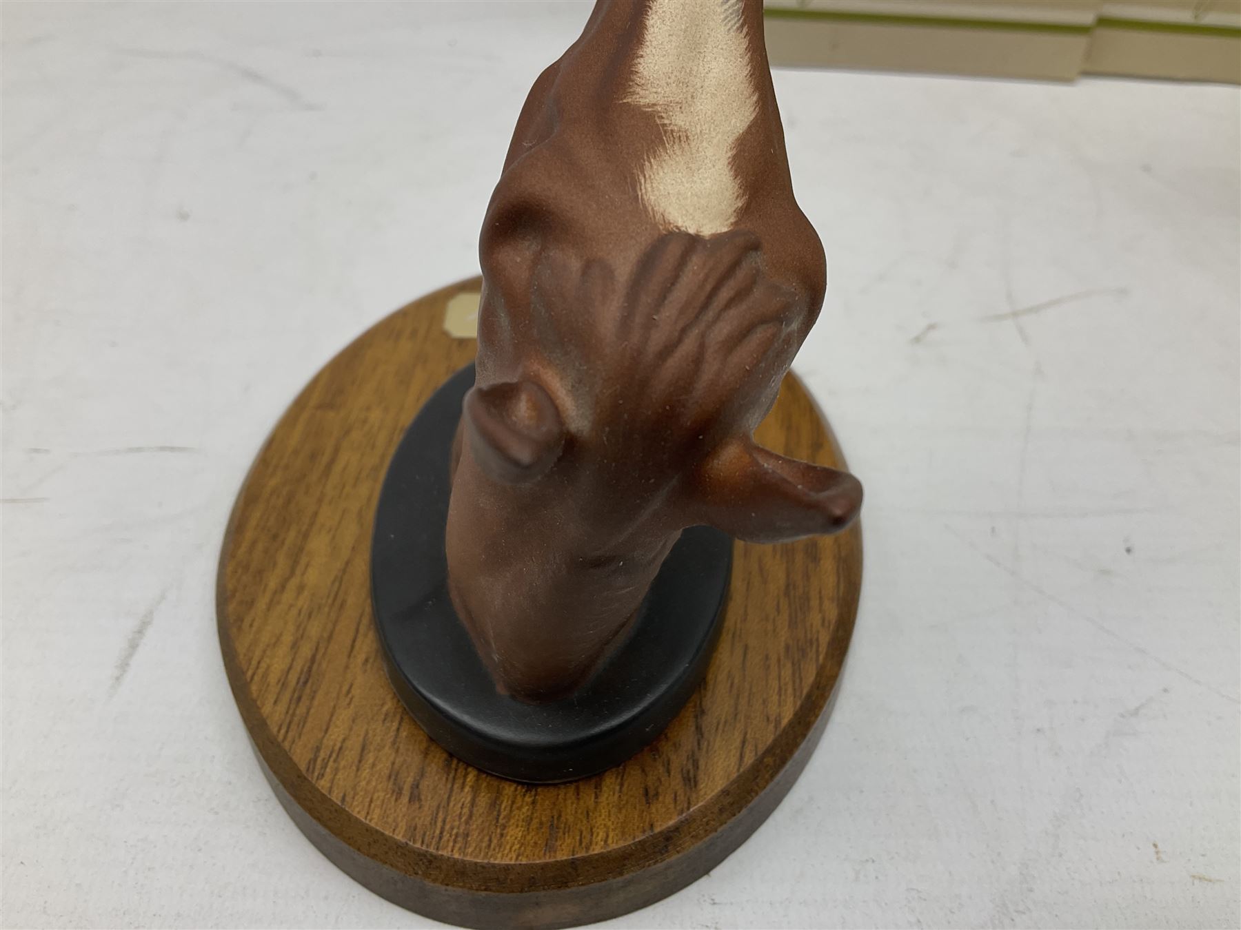 Beswick set of horse head wall plaques 'Champions all', comprising Arkle no.2700, The Minstrel no.2701, Red Rum no.2702, Troy no.2699, all with original boxes