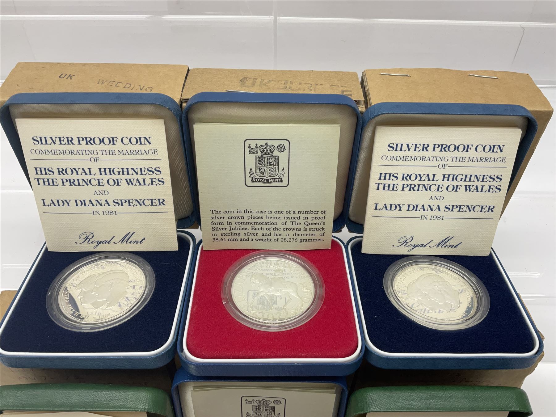 Six Queen Elizabeth II United Kingdom silver crown coins, comprising two 1972 'Silver Wedding', two 1977 'Silver Jubilee' and two 1981 'Commemorating The Marriage of His Royal Highness The Prince of Wales and Lady Diana Spencer', all cased with certificates 
