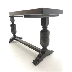  20th century oak refectory table, on two cup and cover baluster supports connected by stretcher, 169cm x 81cm, H78cm  
