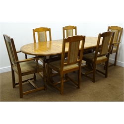  Oval oak finish extending refectory table, harp shaped solid end supports joined by stretcher on sledge feet (91cm x 226cm, H76cm) and set six (4+2) dining chairs, upholstered seat, turned supports  