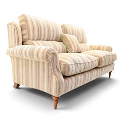 Parker Knoll - contemporary 'Henley' lounge suite comprising grande two seat sofa and wingback armchair, traditional wing shape over rolled arms and turned feet, upholstered in striped fabric