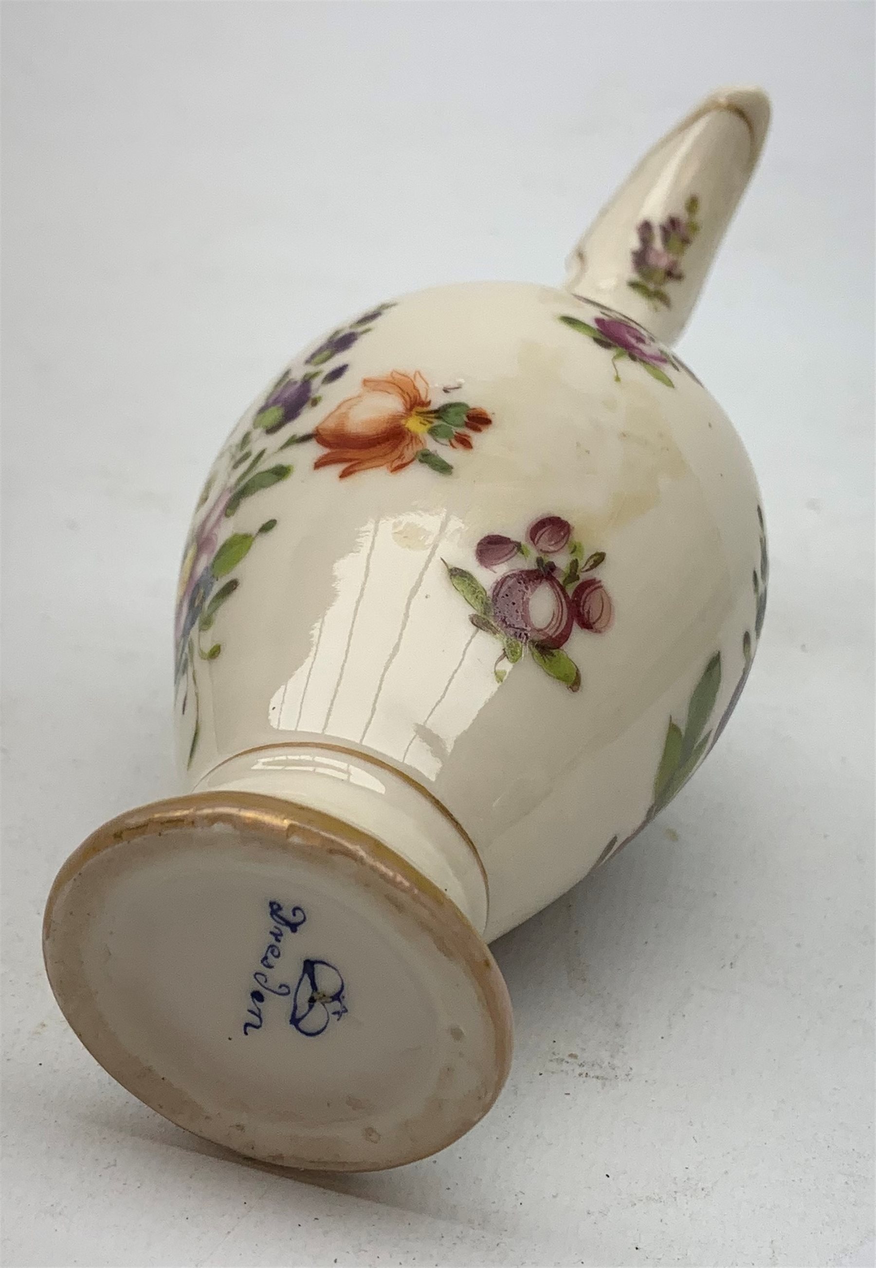 A large 19th century Staffordshire loving cup, detailed 'The Real Cabinet of Friendship Justice and Equity' (a/f), H22cm, together with a pair of 19th century Staffordshire dalmatians, upon oval blue bases, H13cm, a Dresden ewer hand painted with floral sprays, with mark beneath, H15.5cm, and a Coalbrookdale style floral encrusted vase and cover, H16.5cm. 