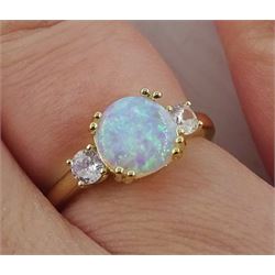 Silver-gilt single stone opal and cubic zirconia ring, stamped 925