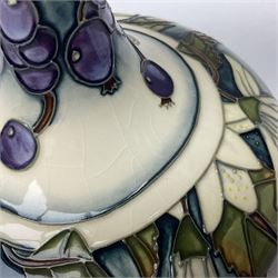 Moorcroft vase, of compressed form with a tall flared neck, decorated in the Juneberry pattern, circa 2000, H25cm