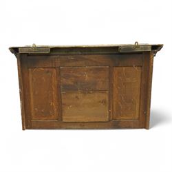 Victorian heavily carved oak wall mirror in distressed grey paint finish, moulded and chip carved cornice over central bevelled mirror and panelled front, the panels carved with urns and scrolled foliage, the uprights with fruiting foliage carved mounts 