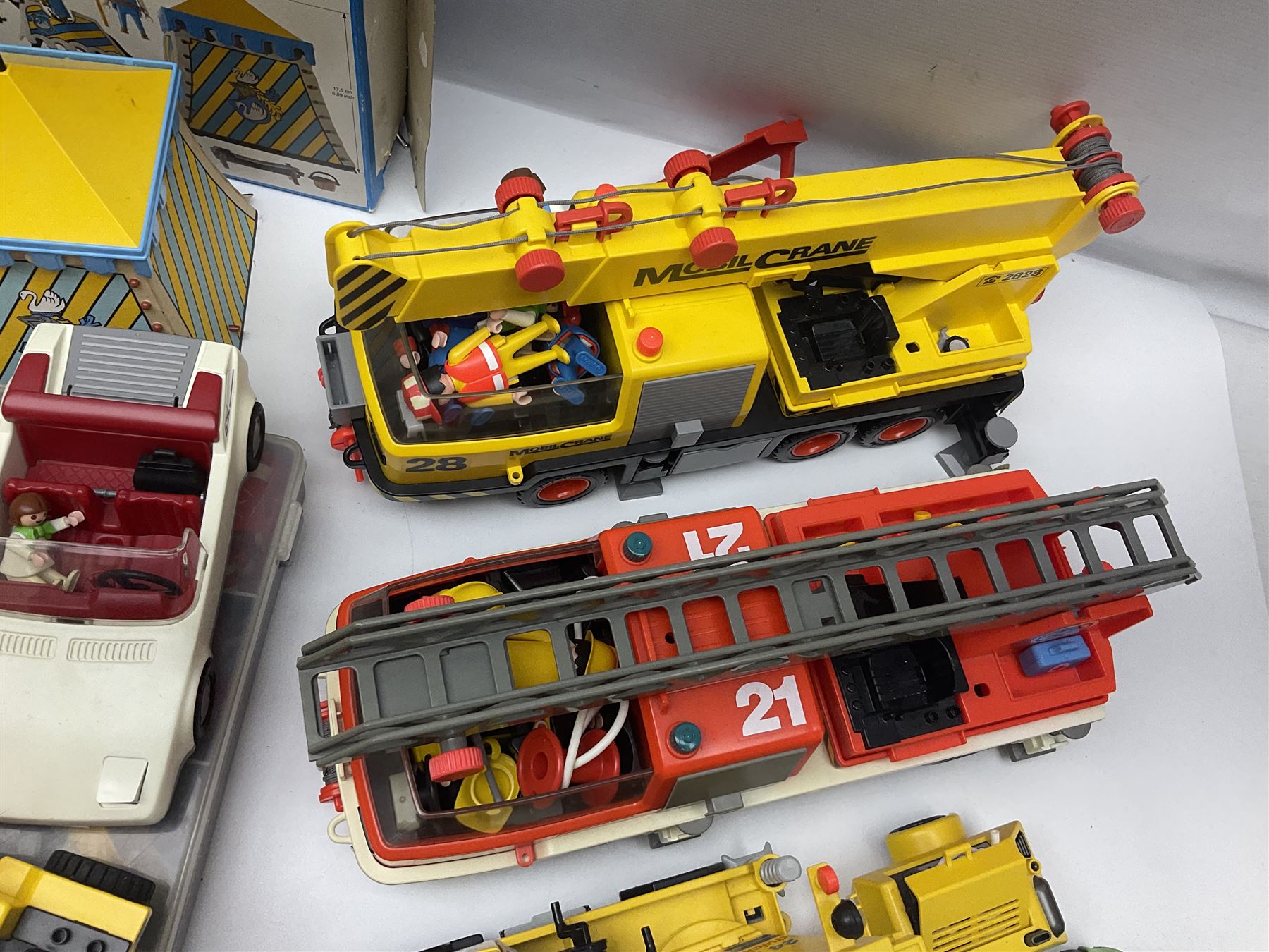 Collection of 1980s/90s Playmobil - vehicles including Fire-Engine No.21, Mobil Crane No.28, Quick Service Truck No.1 with trailer, Dumper Truck, GSL Sports car, GS Turbo car and three motorcycles; together with boxed Knights Tournament Set, Playmospace Space Station and Shuttle, wigwam and various accessories and figures etc