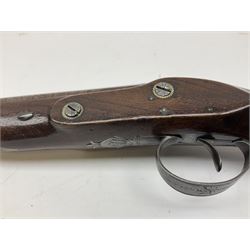 Early 19th century flintlock 16-bore overcoat/duelling pistol by William Bond Lombard Street London, the 23cm octagonal brown stub twist damascus barrel with small foresight, two barrel pins and ram rod under, inscribed Lombard Street London to the top and W. Bond to the action, full walnut stock with lightly engraved steel furniture, pineapple finial and escutcheon, half cock facility L39cm; loose mounted on later mahogany display stand with trade label