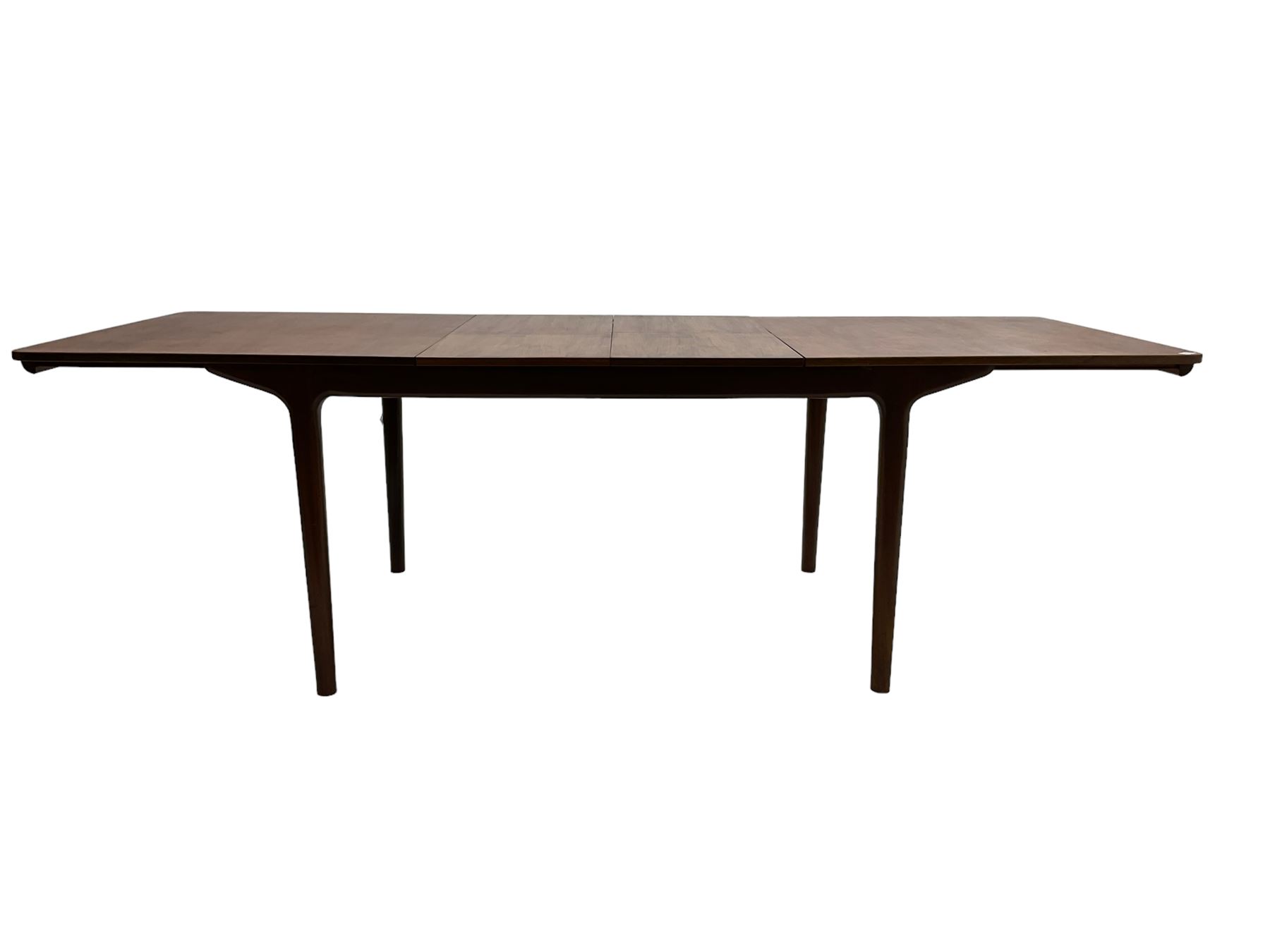 Tom Robertson for AH McIntosh & Co of Kirkaldy - mid-20th century teak extending dining table, rectangular top with rounded corners, concealed integrated double leaf, raised on tapered supports, metal label to underside of leaf