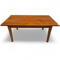 Contemporary solid oak refectory dining table, rectangular quarter-sawn top displaying pronounced medullary rays, on square chamfered legs united by stretchers