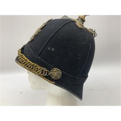 Victorian Officer’s blue cloth helmet, Home Service Pattern complete with gilt metal cross piece, removable spike and rose bosses supporting a velvet backed chin chain; gilt Royal Arms helmet plate to the front; interior retains leather sweatband and bears label for T. McBride & Sons 17 Charles Street Haymarket S.W.