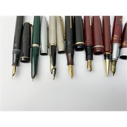 A Croxley Dickinson fountain pen, with black resin body, lever fill action and nib marked 14ct, together with two Waterman's pens, comprising a 502 with black resin body, lever fill action and nib marked 14ct, and an Argent Massif with engine turned decoration to body and nib marked 18K, an Osmiroid fountain pen with burgundy resin body and lever fill action, two further fountain pens, and a propelling pencil. (7). 