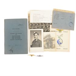 WWII Royal Air Force battle dress blouse, belonging to Flight Sargent Colin Scott 3011422, dated 1945, tailors label for M & N Horne Ltd 1945, Size No 7, blue cloth, Signaller cloth brevet, wireless officers patch to right sleeve and braid sergeant stripes to both sleeves, together with his flight log book, postings & Movements, Royal Air Force Service and Release Book, photographs etc  