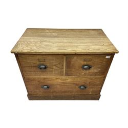 Early to mid-20th century oak chest, fitted with two short drawers over one long drawer, raised on plinth base