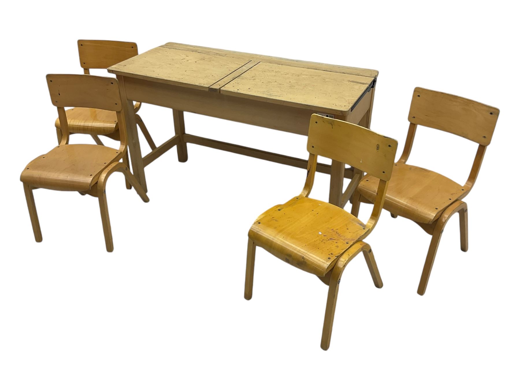 Mid-20th century beechwood school desk, rectangular lift-top desk with storage compartment, supported by square legs with cross stretchers; four matching beech chairs (5)