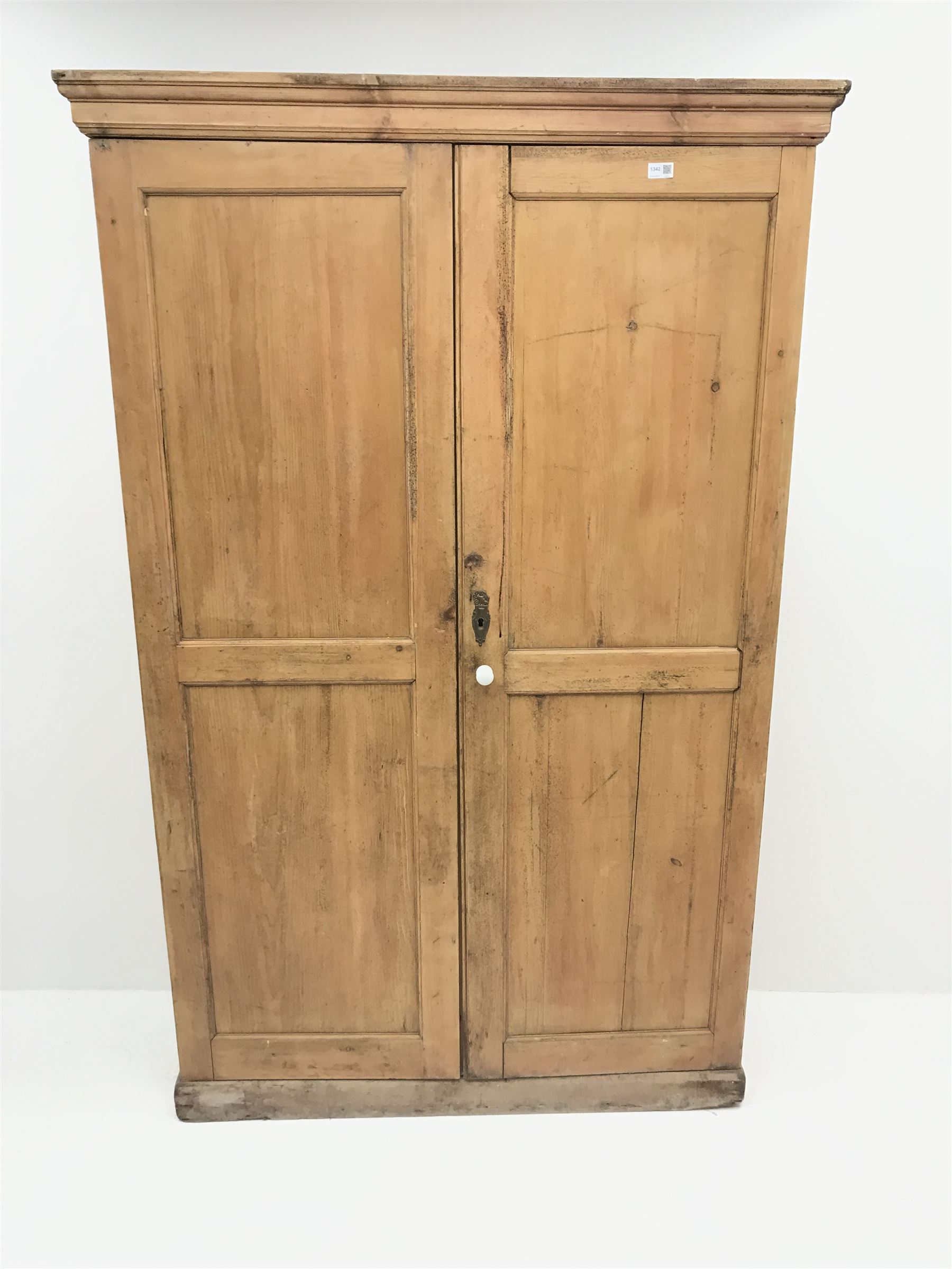 19th century housekeeping cupboard, projecting cornice above two panelled doors, plinth base