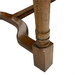 Late 20th century oak dining table, rectangular top with two draw leaf extensions, on turned supports united by moulded hayrake stretchers (180cm - 278cm x 90cm, H76cm); set of eight (6+2) oak dining chairs, shaped cresting rail over shaped splat back, upholster drop-in seat, on cabriole supports united by turned H-shaped stretchers 