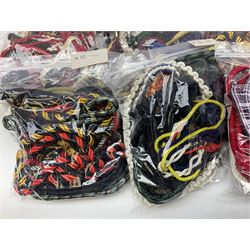 Approximately one-hundred and twenty lanyards in military colours, various styles