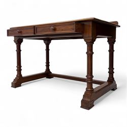 Late Victorian mahogany side table in the style of Gillows of Lancaster, mahogany rectangular top above two frieze drawers, the top edge of the right drawer stamped 'Gillow' and 'L486' with knob handles supported on turned stop and fluted legs with stretcher base on recessed castors

Provenance: The Davies-Cooke Collection from Gwysaney Hall, North Wales  